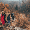 Surviving the Chill of Fall Hiking & How to Recognize and Treat Hypothermia with hikers on a rocky trail in autumn.