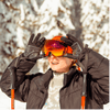 Woman wearing ski goggles outdoors, focusing on Essential Tips for Snow-Blindness Prevention and Treatment.