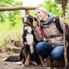 Keep Your Dog Safe on the Trail: Snake Bite Prevention and Response - woman and dog on a hiking trail.