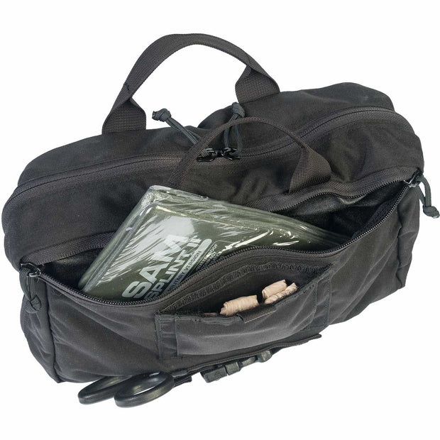 Patrol Vehicle Trauma Kit containing medical supplies organized in a tactical black bag with pockets and handles.