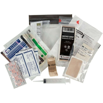 Critical Environment Emergency Kit contents including bandages, medical supplies, and emergency gear.