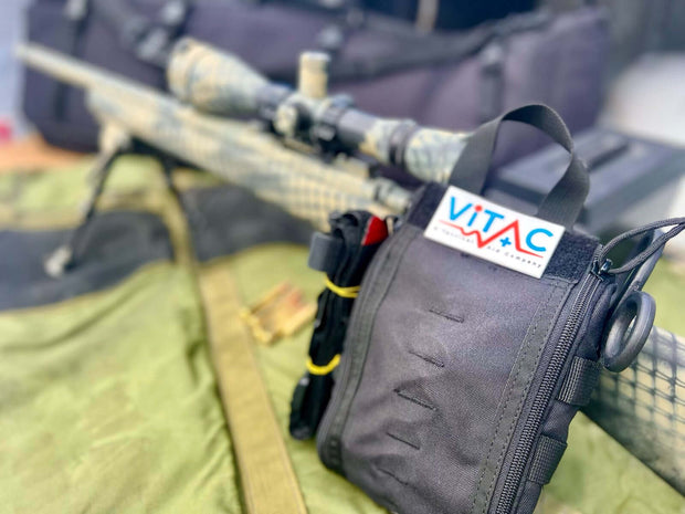 ViTAC Tactical Individual First Aid Kit (IFAK) close-up on a tactical setup, designed for emergency medical support.