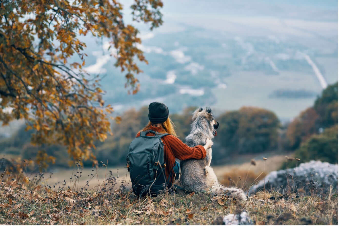 The Essential First Aid Items Every Dog-Owning Adventurer Should Have, woman with dog in nature.
