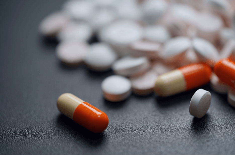over-the-counter medication spilled out on a table