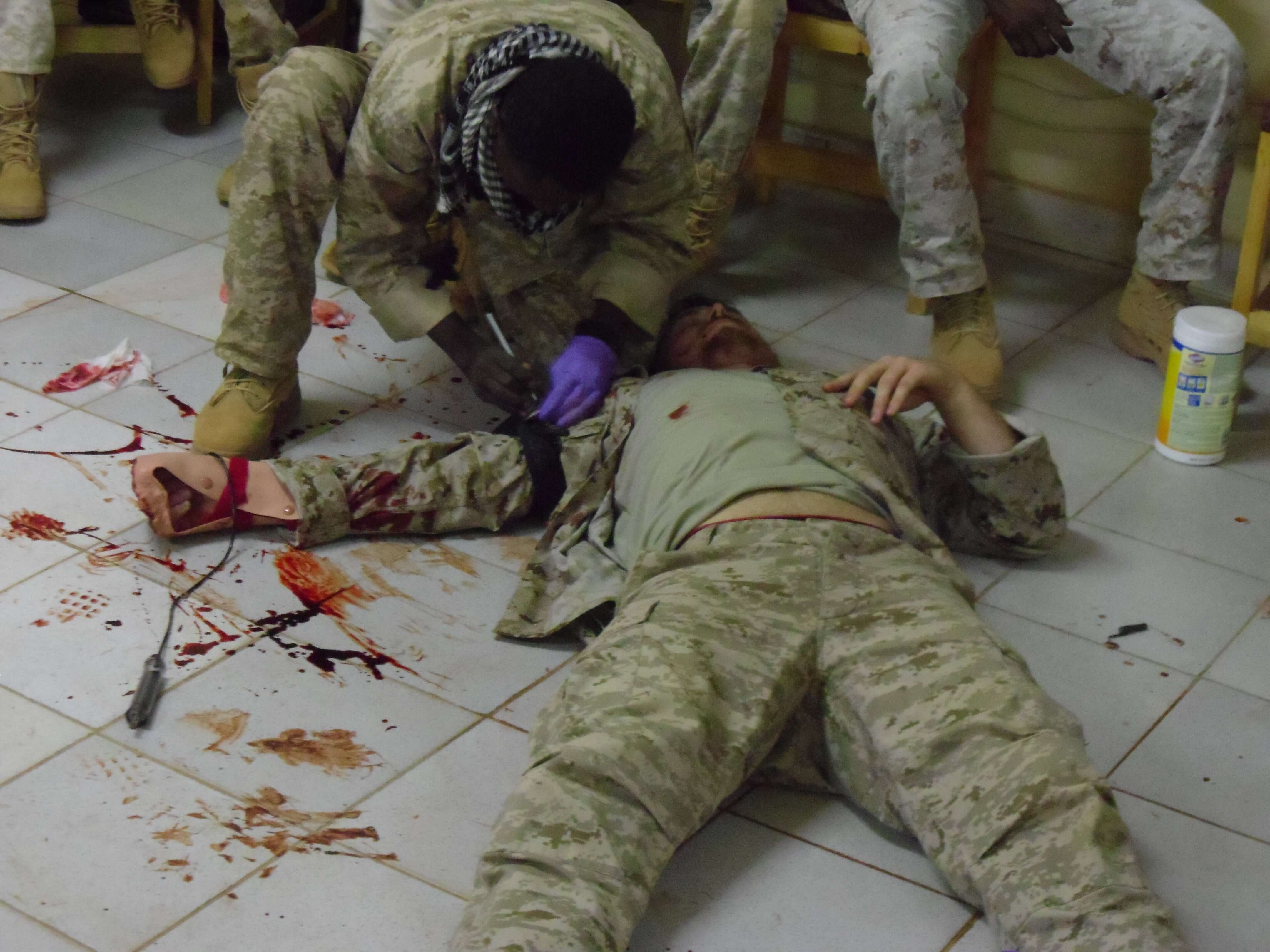 a soldier training on field first aid readiness