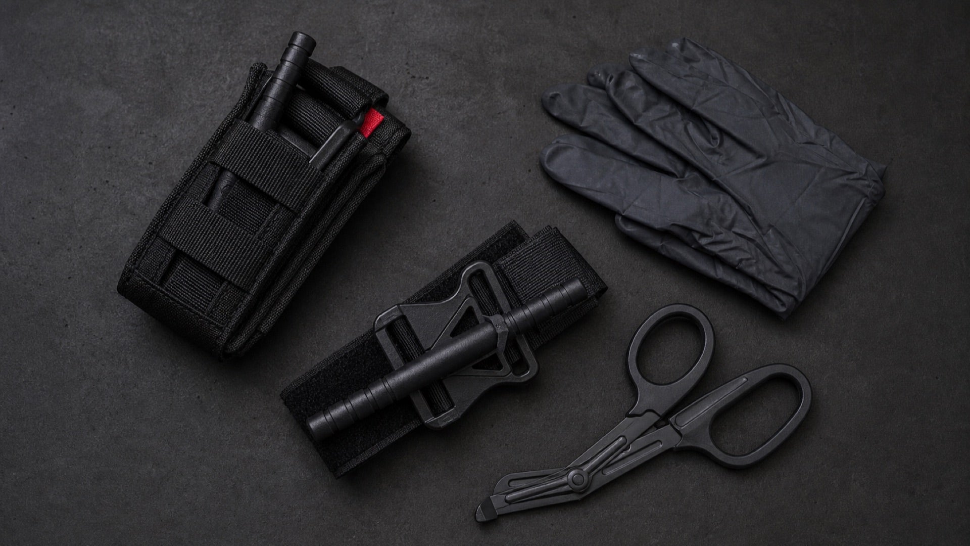 Tourniquet quantity for trauma kits including gloves, scissors, and tourniquet gear on a dark background.