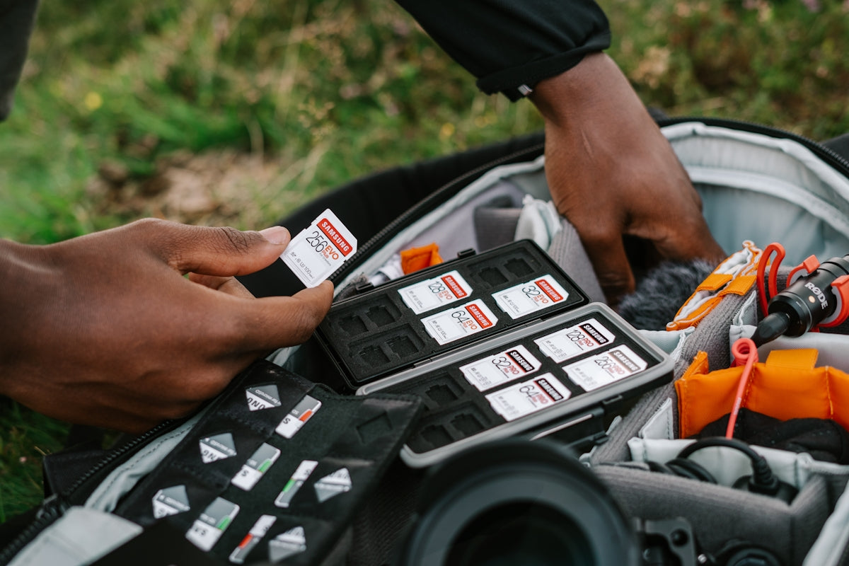 How to Choose a Trauma Kit components with hands sorting through gear.