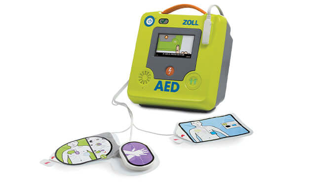 ZOLL Automated External Defibrillator (AED) with clear instructions and pads for easy operation in emergencies.