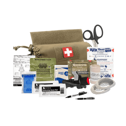 First aid kit with various medical supplies on a white background