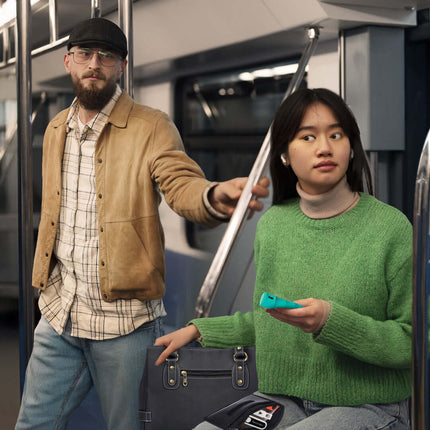 The Stay Safe Self Defense Kit user in transit, showcasing personal safety tools in stylish pouch.