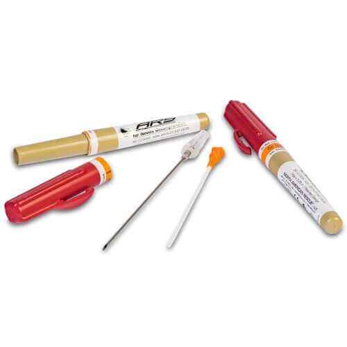 Decompression needle kit including 3.25" needle, sterile packaging, and accessories in professional medical use.
