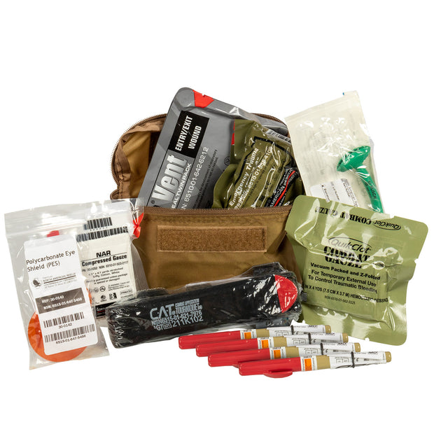 Assorted survival or tactical gear items on a white background