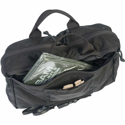 Patrol Vehicle Trauma Kit containing medical supplies organized in a tactical black bag with pockets and handles.