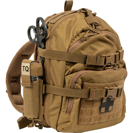 Tan tactical backpack with various compartments and equipment on a white background