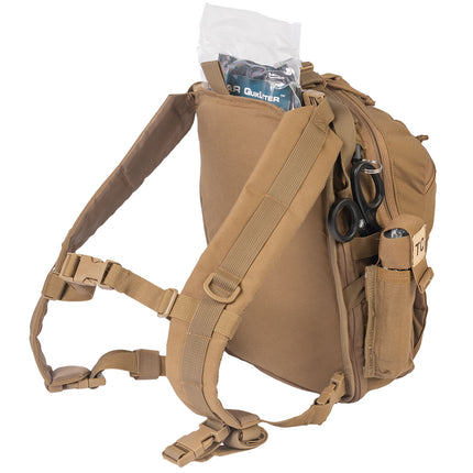 Tan backpack with various compartments and items on a white background