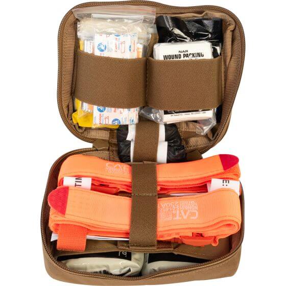 Headrest IFAK kit opened, showcasing essential medical supplies for trauma response and emergency readiness.