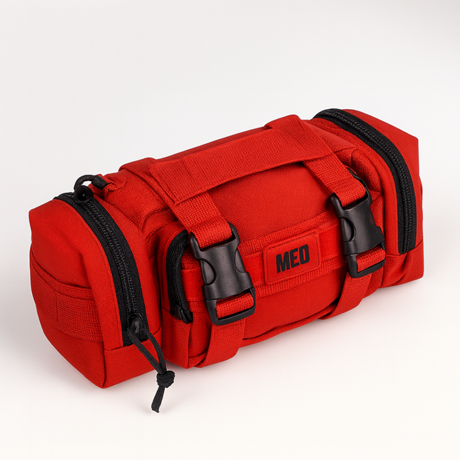 Rapid Response Trauma Kit in red with MOLLE compatibility and organized compartments for bleeding control essentials.