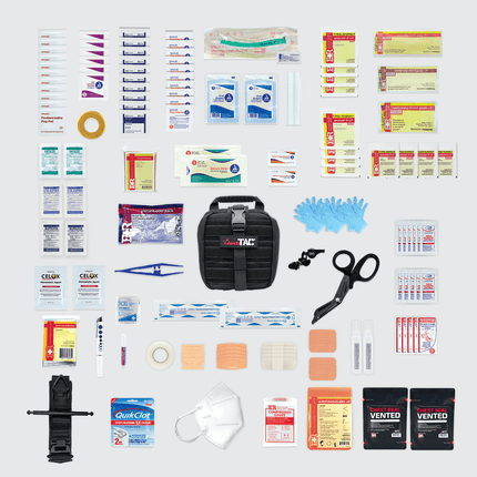 Small Rip Away Tactical Trauma Kit contents including gauze, tourniquet, chest seals, scissors, and first aid supplies.