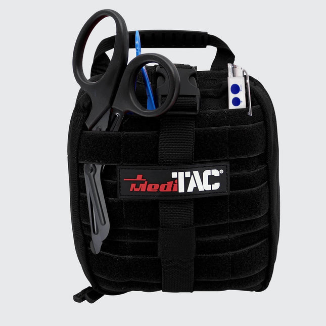 Small Rip Away Tactical Trauma Kit with EMT shears and tools for emergency response, featuring a compact design by MediTac.