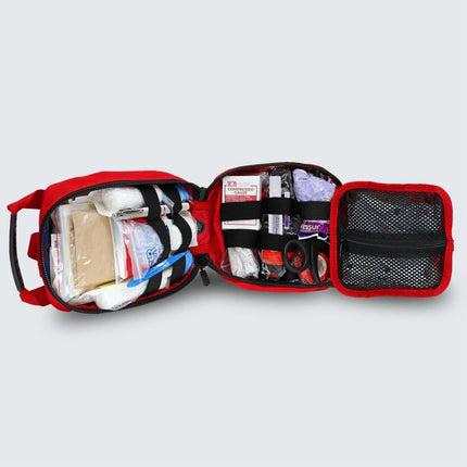 Open Small Rip Away Tactical Trauma Kit showing medical supplies and tools for emergency response.