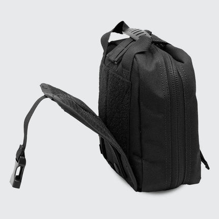 Small Rip Away Tactical Trauma Kit in black, featuring a compact design with easy access for emergency medical supplies.