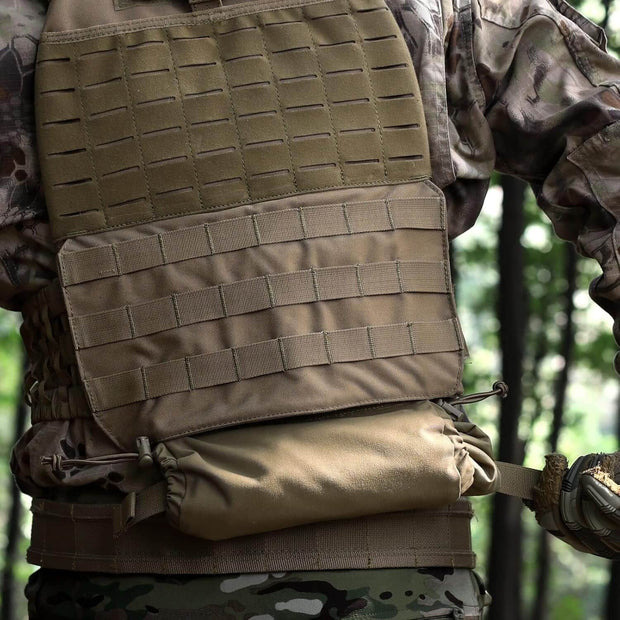 1st Line IFAK mounted on tactical vest, ideal for law enforcement and military personnel. Organized hemorrhage control gear.