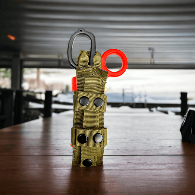 ONE SHEAR® First Response TQ Holster, a tourniquet holster for first responders, showcasing secure tool storage.