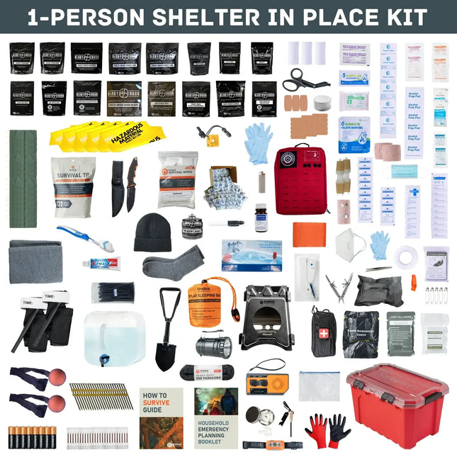 Collection of survival items including a red shelter in place kit on a white background.