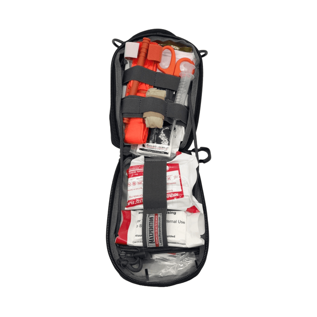 First aid kit with various supplies on a white background