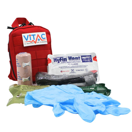 ViTAC Everyday Carry Trauma Kit featuring medical supplies in a compact red pouch for emergency readiness.