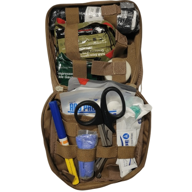 Open Enhanced Individual First Aid Kit showing medical supplies, scissors, and trauma essentials.