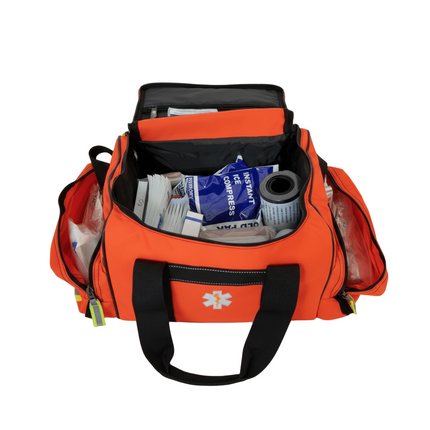 Open first responder jump bag filled with medical supplies for emergency situations.