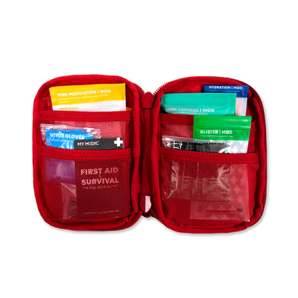 Sidekick IFAK Pouch by MyMedic open view showing organized first aid supplies.