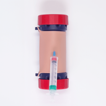 MITS Composite Trainer Kit with syringe for practicing needle insertion skills on the go.