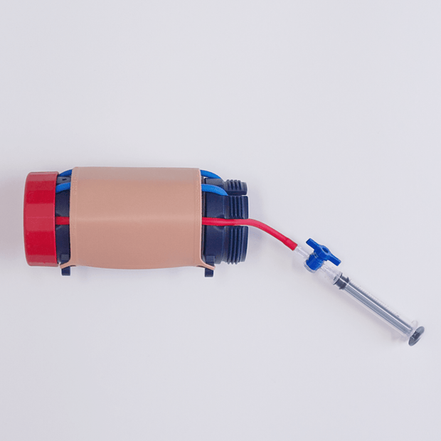 MITS Composite Trainer Kit portable training device showcasing needle insertion capability for skill enhancement.
