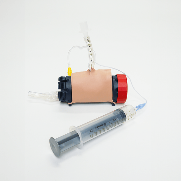 MITS Composite Trainer Kit showing a portable device for practicing needle insertion skills.