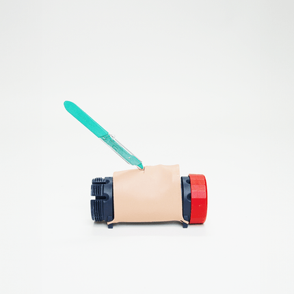 MITS Composite Trainer Kit with needle insertion practice tool on a portable training device.