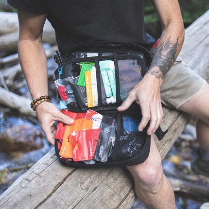 MyFAK First Aid Kit open, showing various medical supplies and organized compartments, ideal for emergencies.