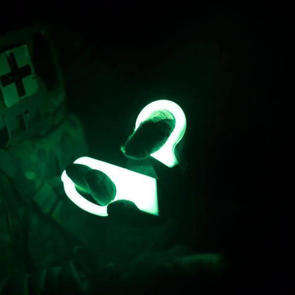 emergency trauma shears for EMTs glowing in the dark, perfect for night-time use in medical emergencies.