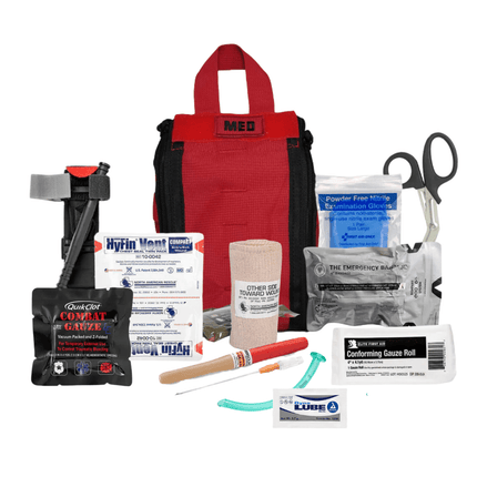 First aid kit with various medical supplies on a white background
