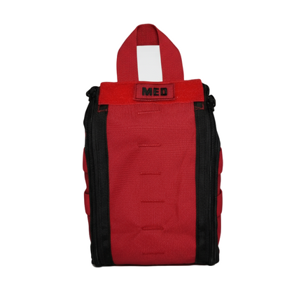 Red tactical medical bag with black zippers and handle, designed for emergency trauma kits.