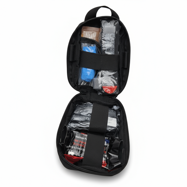 K9 First Aid Kit opened, showcasing essential canine trauma supplies for dog owners.