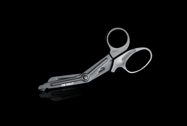 ONE SHEAR® lightweight medical scissors for EMT with a black non-stick coating and blunt tip.