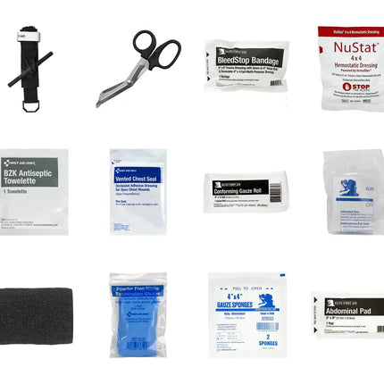 Image of Tactical IFAK w/Hemorrhage Control with scissors, bandages, gauze, and essential first aid supplies.