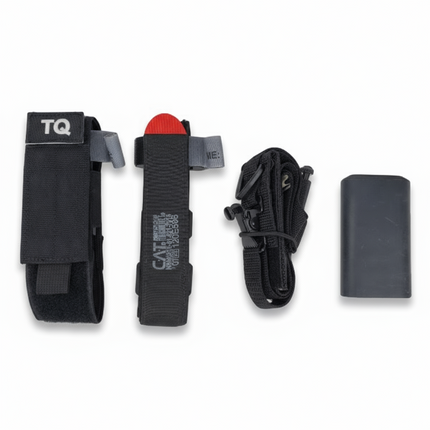 Collection of tactical gear including a pouch with 'TQ' label, flashlight, lanyard, and small device on a white background.